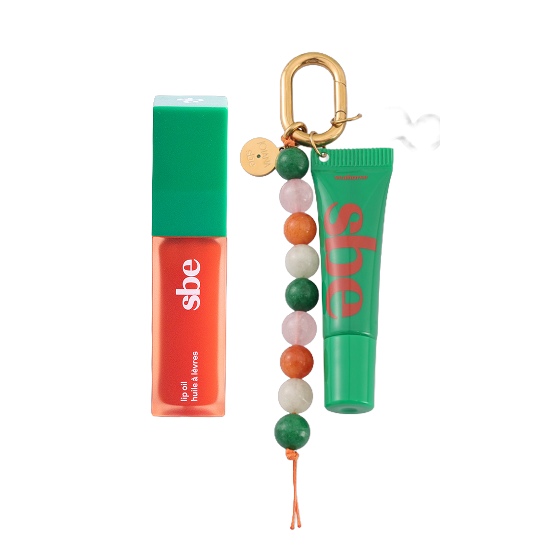 Seahorse lip oil mini bag charm and full-size Seahorse lip oil side by side